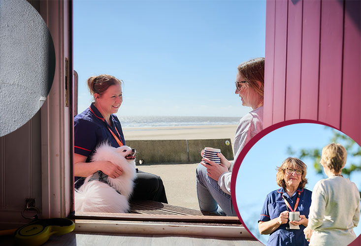 A Hospice in the Home nurse sitting in a beach hut in Walton with a dog, speaking to a family member of somebody receiving care
